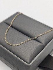 14k Yellow Gold 0.6 mm Twisted Chain Necklace. Adjustable Chain Necklace.