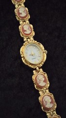 Women’s Gold Tone Cameo Bracelet Wristwatch Quartz Analog Oval Dress Watch
