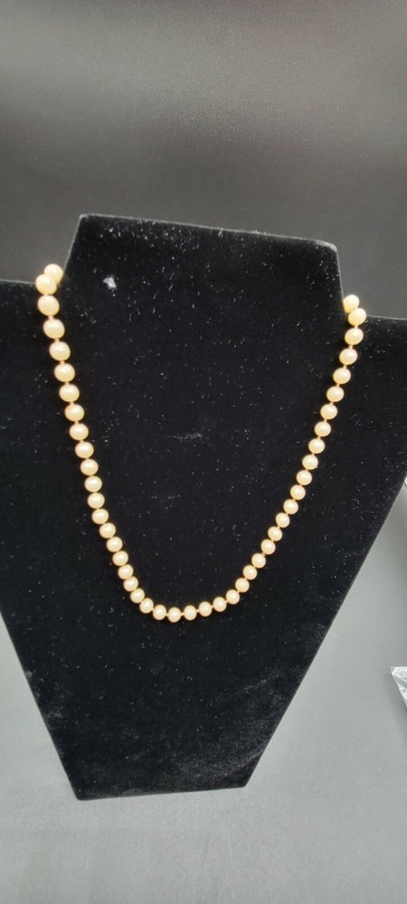 Vintage Man-Made Pearl Necklace. 19 inch long. Color Cream.