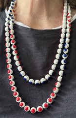 Vintage 1950 red, white, and blue plastic puzzle bead necklace