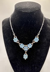 Vintage 1959 rhodium-plated necklace / blue thermoset flower and rhinestones