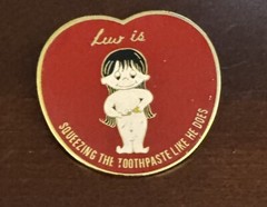 Love Is… Brooch Pin Cartoon Red Girl Luv Is Squeezing The Tooth 70s Valentine