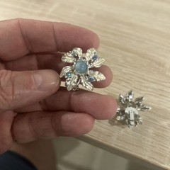 Vintage Judy Lee rhinestone and blue aurora borealis moon glow clip on earrings