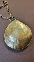 South sea mother of pearl pendant on 16″ silvertone chain with extender by Ivana