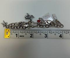 James Avery Sterling silver Charm bracelet with 6 Charms 7.5 Inch. 18+ Grams.