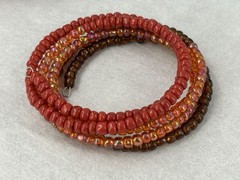 Multicolor Beaded Memory Coil Bracelet Orange Brown Red Iridescent