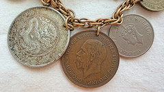 VINTAGE COIN CHARM BRACELET 11 INT COINS