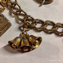 VINTAGE MONET GOLD TONE BRACELET WITH 6 CHARMS AND SAFETY CHAIN 4 leaf clover