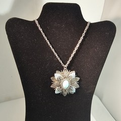 Vintage Southwest style Silver Tone Medallion pendant: Turquoise color cabochon
