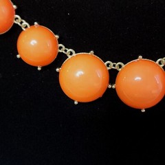 2 Statement Necklaces each 18″-20″ one Black and one Orange.