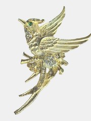 This elegant vintage-style gold-tone bird brooch 3” long by 1.5” wide