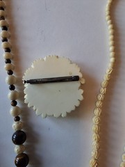 Vintage Carved Necklaces Earrings And Old Brooches.