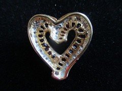 14K Solid Gold, (16) Diamonds & (22) Ruby’s. Heart Pendant.