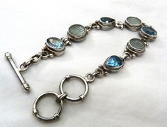 LARGE OVAL FACETED BLUE TOPAZ MELON CARVED QUARTZ STERLING SILVER BRACELET