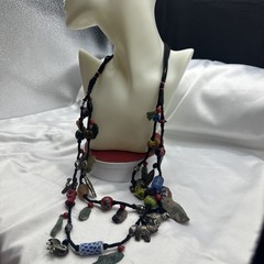 Vtg Indian Glass Beads Stone Nuggets and Seven Puffed Animals Cord Necklace.Read