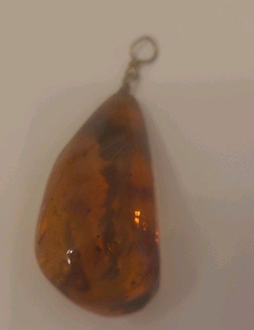 Vintage Amber Pendant 1.5 Inches Long .75 Inches Wide
