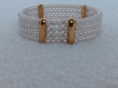 Vintage 4 Strand Faux Pearl Goldtone Tension Cuff Bracelet 7.5 in
