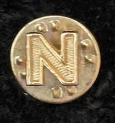 B.A. Ballou & Co., indicated by the “BALLOU REG’D” Letter “N” lapel pin VINTAGE