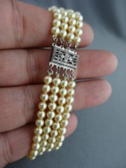 VINTAGE MARVELLA ART DECO STERLING 4 STRAND PEARL STRUNG TENNIS BRACELET