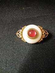 White Cream Colored Lucite Brooch with Red Glass Cabachon in Goldtone Filligree
