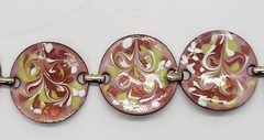 Vintage 7″ enamel on copper bracelet, round, bent sections, fold over clasp