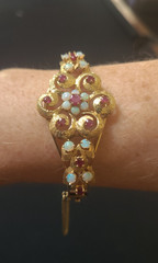 Spectacular Victorian 14K Yellow Gold Bangle Bracelet w/ Rubies and White Opals.