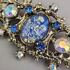Vintage Foiled Glass Brooch Aurora Borealis Blue Oval Gold Tone 2 3/8″