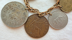 VINTAGE COIN CHARM BRACELET 11 INT COINS