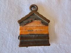 Vintage mid-century “I’m in the dog house” plastic pendant