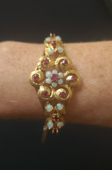 Spectacular Victorian 14K Yellow Gold Bangle Bracelet w/ Rubies and White Opals.