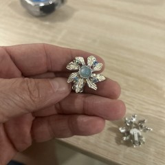 Vintage Judy Lee rhinestone and blue aurora borealis moon glow clip on earrings