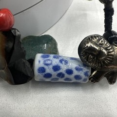 Vtg Indian Glass Beads Stone Nuggets and Seven Puffed Animals Cord Necklace.Read