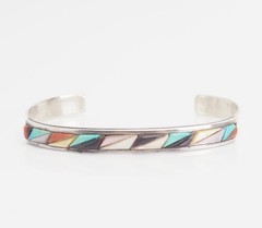 Vintage sterling silver and inlaid gemstones cuff bracelet by Victor Moses Begay