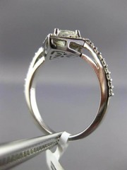 WIDE .99CT ROUND & PRINCESS DIAMOND 14KT WHITE GOLD HALO SQUARE ENGAGEMENT RING