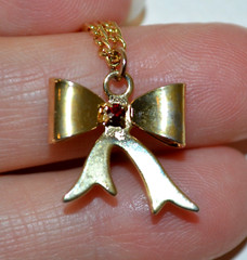 Vintage Gold Tone Necklace & Bow Shaped Pendant with Red Rhinestone