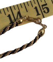 Trifari braided necklace, black and gold tone, 29 in length, signed Tifari