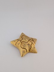 Vintage Signed JJ Brushed Gold Tone White Glass Rhinestone Chunky Star Brooch