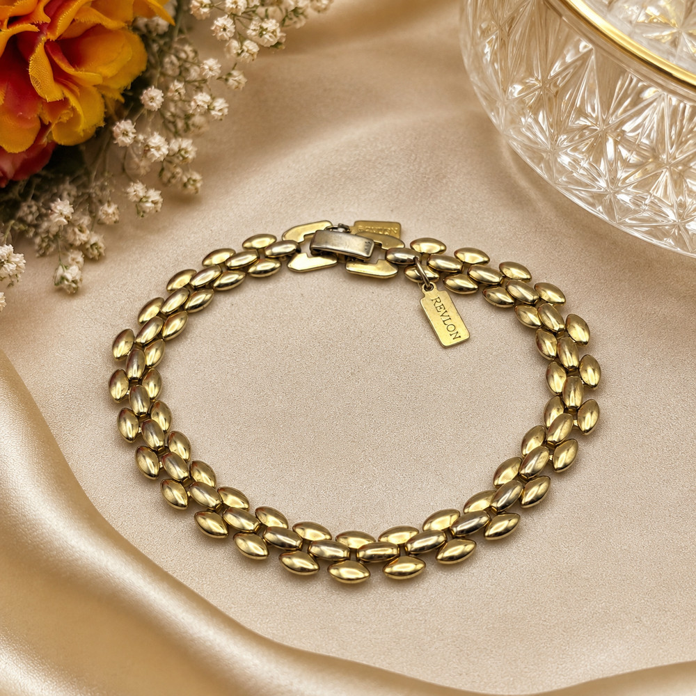 Vintage Revlon Gold Tone Double Row Navette Link Bracelet Fold Over Clasp 7.5 in
