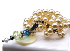 Crystal and Mother of Pearl Pendants on Lustrous Knotted Glass Pearl Strand
