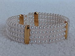Vintage 4 Strand Faux Pearl Goldtone Tension Cuff Bracelet 7.5 in