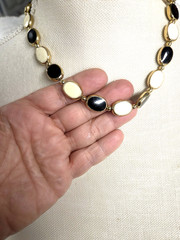 Vtg gold tone chain strung black cream 2 sided Necklace