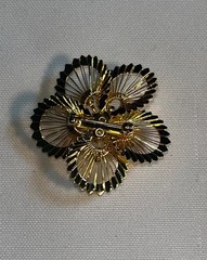 Gold tone Flashy Floral Pin With Multiple Simulated Diamonds