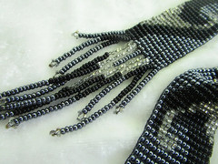 vintage 56-inch necklace or belt, beaded in blue, white, black wave pattern