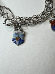 Vintage travel bracelet Sterling with charms popular between 1950 and 1970,