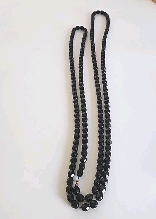 Black faceted beaded necklace. Long! 26″ long.