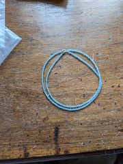17″ 2.5 mm faceted aquamarine necklace with 14 k gold clasp