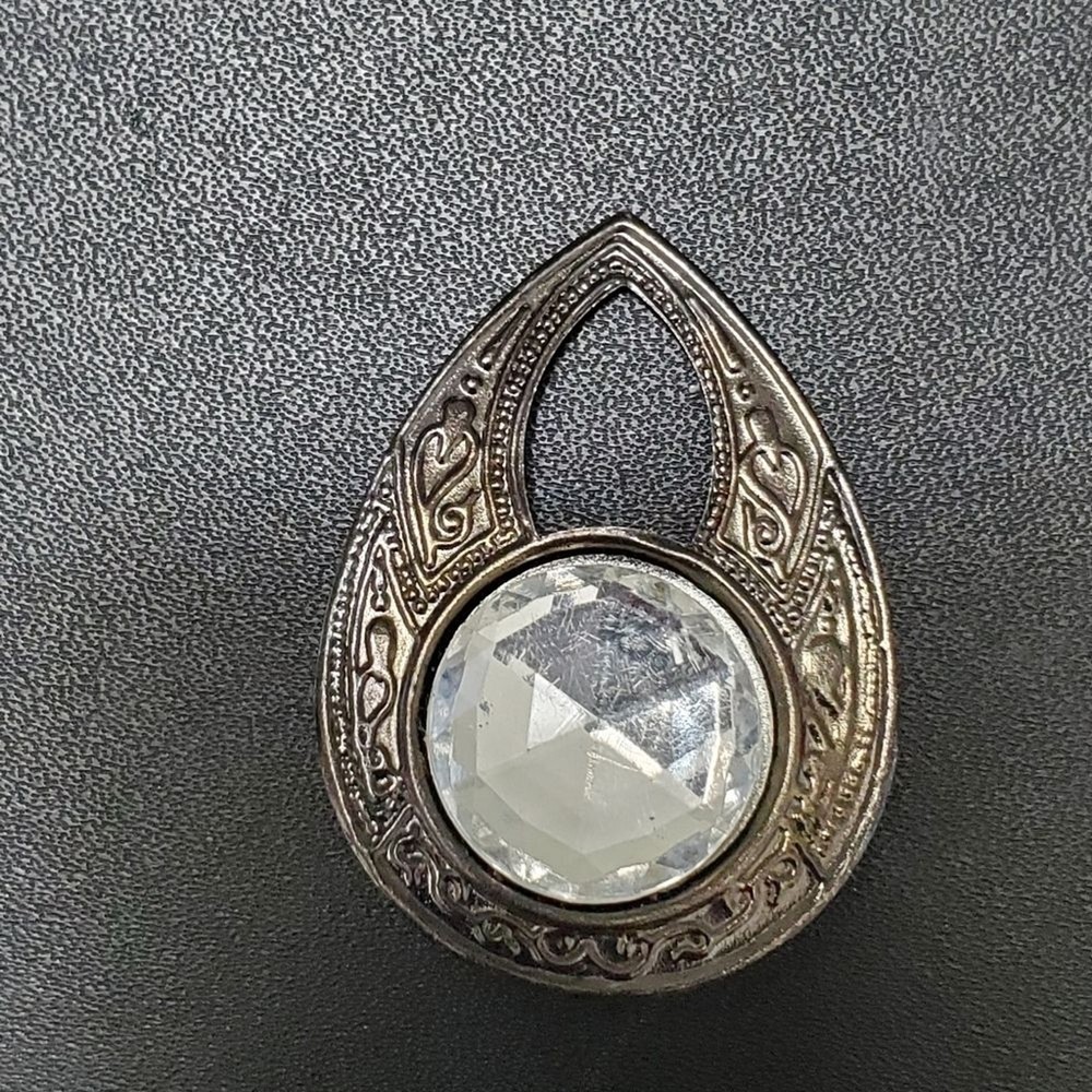 Dark silver tone rhinestone teardrop shaped brooch