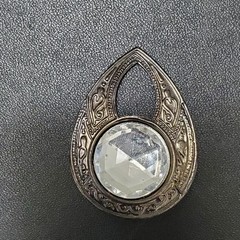 Dark silver tone rhinestone teardrop shaped brooch