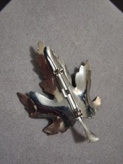 Maple leaf figural brooch, silvertone finish, blue ombre design