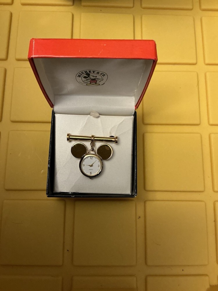 Mickey & Co by Napier Vintage Gold Tone MM Silhouette Lapel Pin Watch 12409